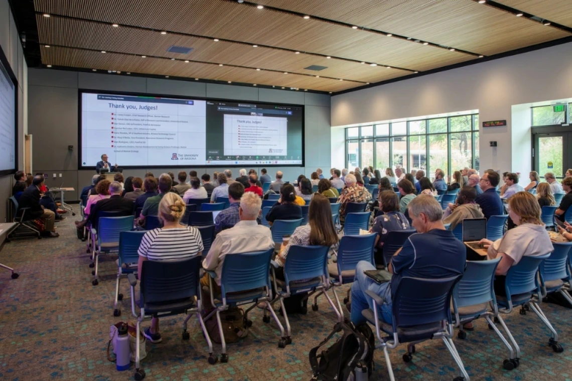 An image of a person giving a presentation to a room full of people.